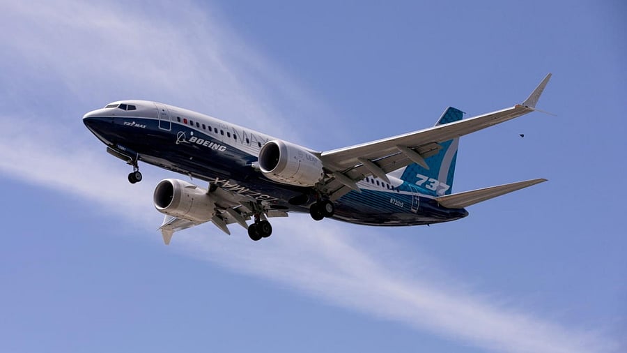 A Boeing 737 MAX airplane lands after a test flight at Boeing Field in Seattle. Credit: Reuters Photo