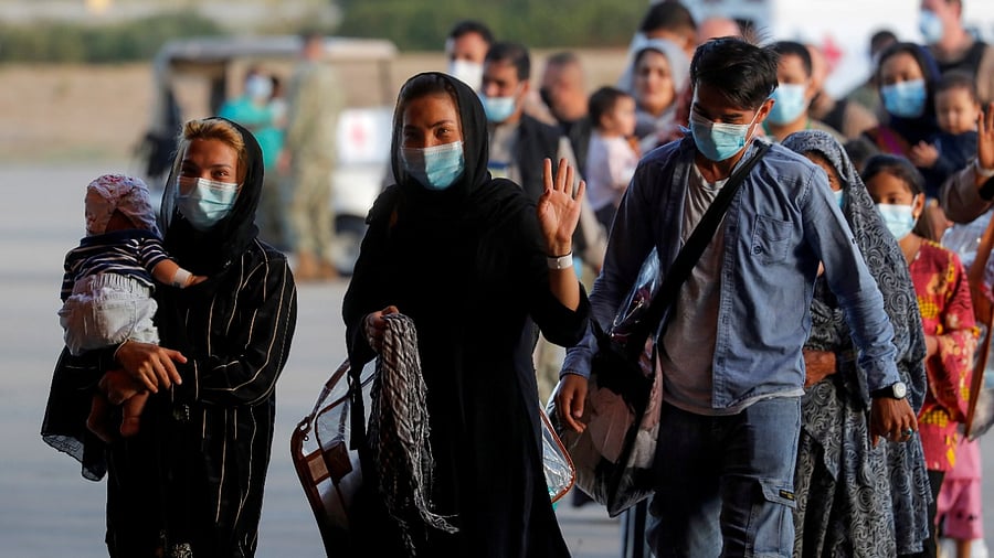 Afghan evacuees from Kabul arrive at Naval Station. Credit: Reuters File Photo