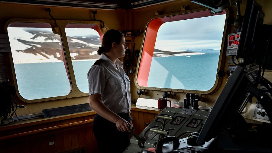 Standing on the bridge of the ship, she is surrounded by screens relaying information from dozens of sensors. Credit: AFP Photo