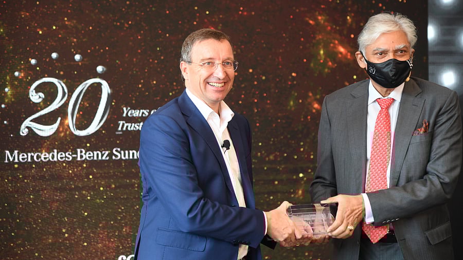 Martin Schwenk, Managing Director & CEO, Mercedes-Benz India, and Sharath Vijayraghavan, Executive Director, TVS Sundaram Motors, during an event to celebrate 20 years of the association between Mercedes-Bens and Sundaram Motors. Credit: DH Photo/ B H Shivakumar