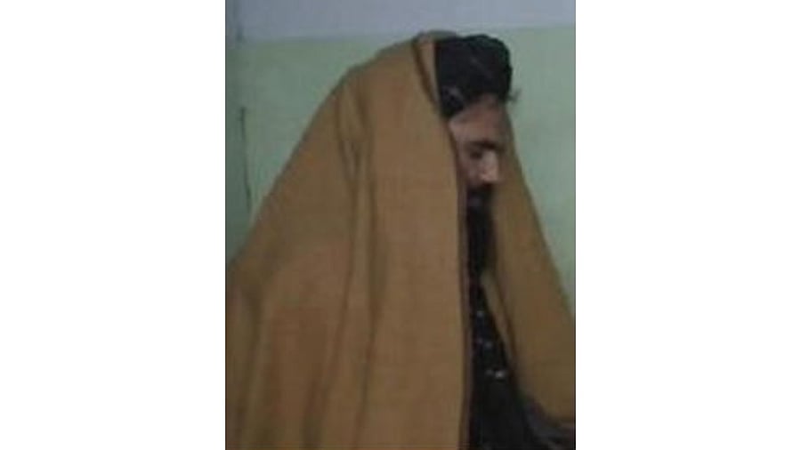 The 'Seeking Information' poster issued by the US Federal Bureau of Investigation for Sirajuddin Haqqani, who is Afghanistan's newly appointed acting interior minister. Credit: FBI/Handout via Reuters