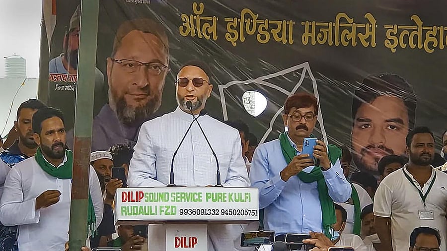 AIMIM President and MP Asaduddin Owaisi addresses a conference at Rudauli in Ayodhya. Credit: PTI Photo