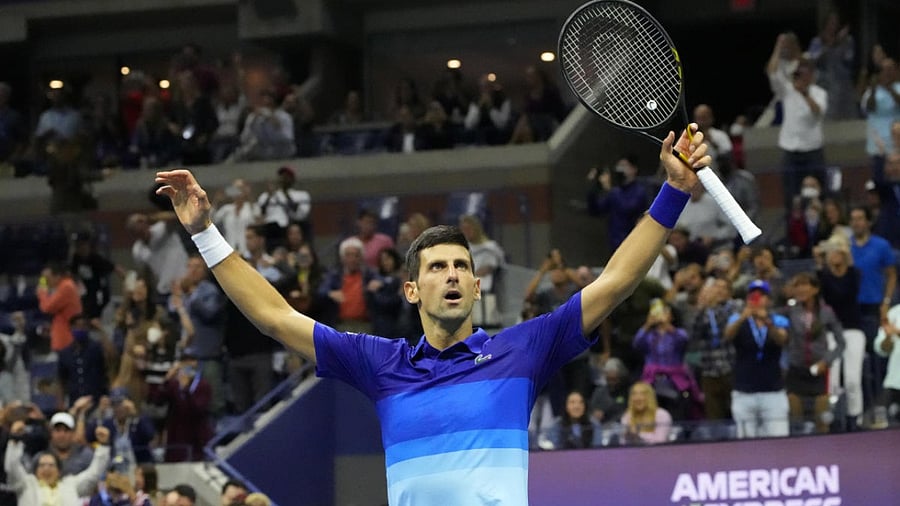 Novak Djokovic of Serbia celebrates after match point against Alexander Zverev of Germany (not pictured) on day twelve of the 2021 U.S. Open tennis tournament at USTA Billie Jean King National Tennis Center. Mandatory Credit: Robert Deutsch. Credit: USA TODAY Sports