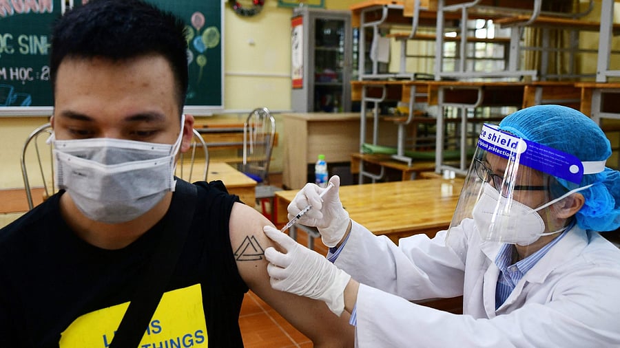 US announced strict vaccination rules to fight the new Covid wave due to Delta variant. Credit: AFP Photo