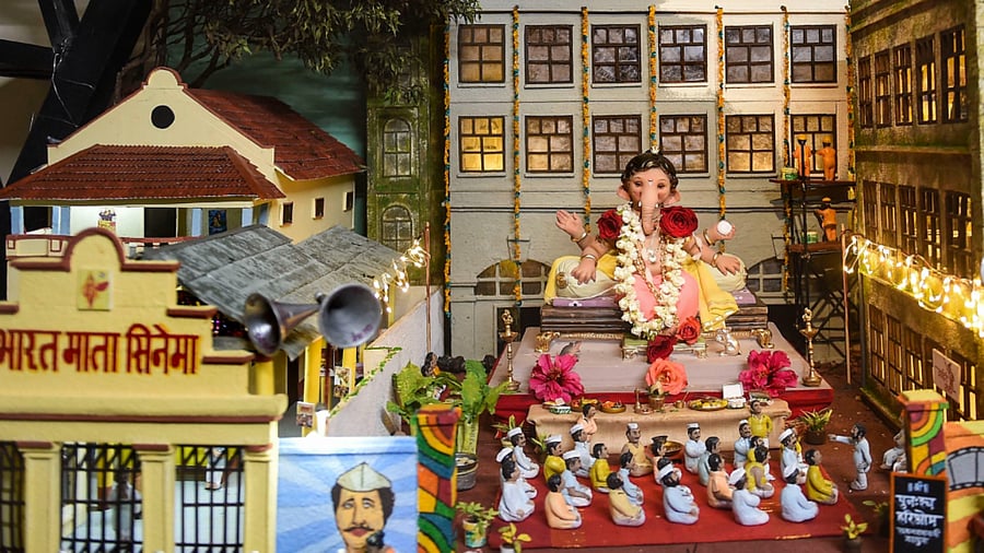 Ganpati idol shows the famous Bharat Mata cinema of Lalbaug and United Mills, capturing what was once Bombay. Credit: PTI Photo