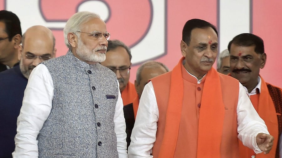 Prime Minister Narendra Modi along with Vijay Rupani. Credit: PTI File Photo