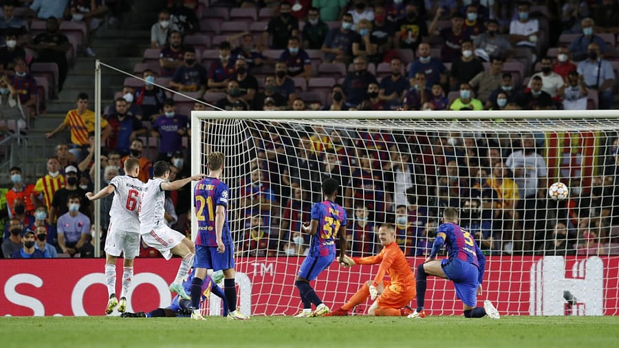 Bayern Munich's Robert Lewandowski scores their third goal. Credit: Reuters Photo