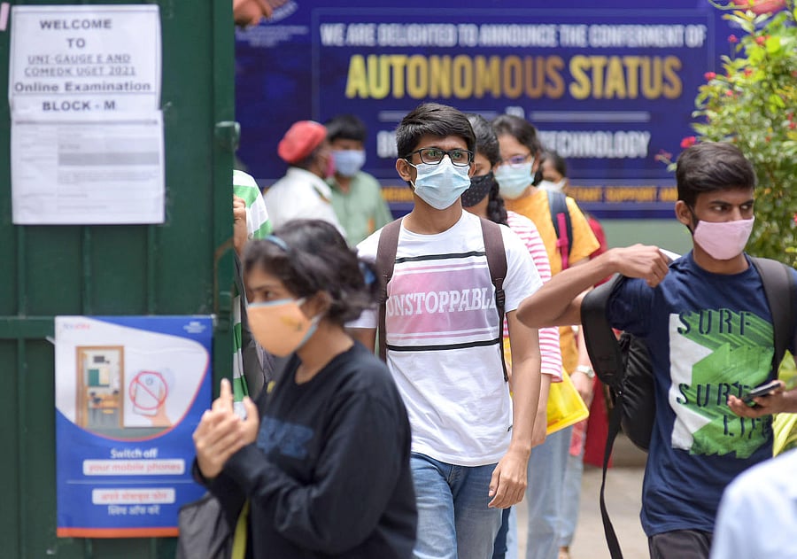 Students come out after appearing for the Comed-K test  at BNM Institute of Technology, Banashankari, Bengaluru, on Tuesday. DH PHOTO/PUSHKAR V