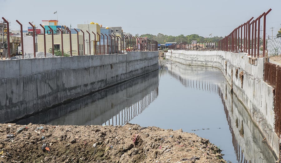 A performance audit criticised agencies for lack of financial discipline, shoddy mapping of storm water drains and tertiary drains. Credit: DH File Photo