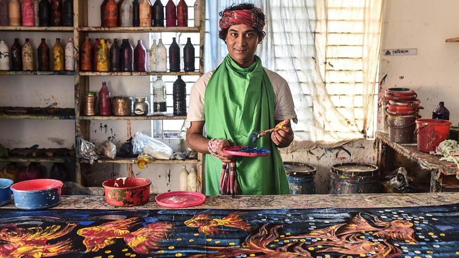 A transgender person works at Bhuyan Fashion garment factory owned by Siddik Bhuyan Synthia, a transgender in Dhaka. Credit: AFP Photo
