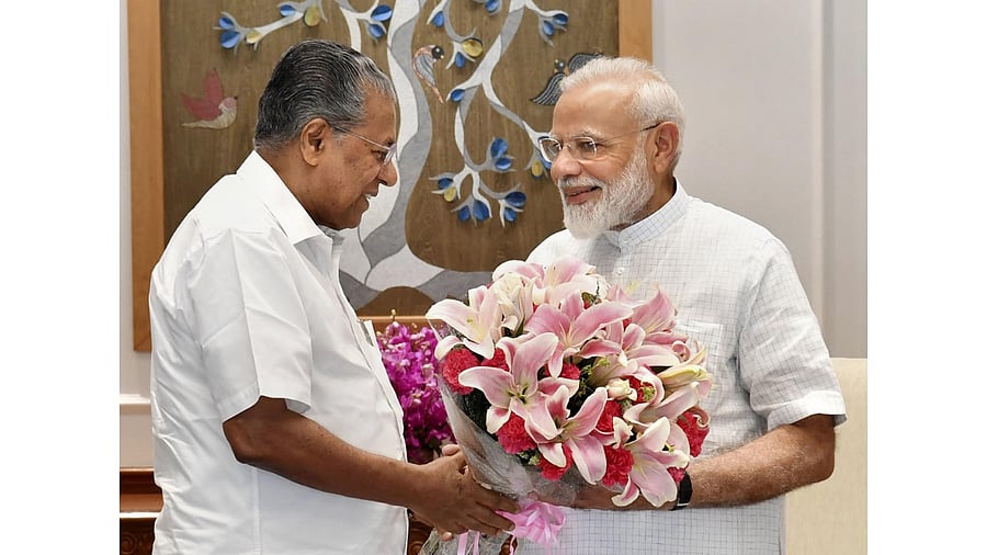 Kerala Chief Minister Pinarayi Vijayan and Prime Minister Narendra Modi. Credit: PTI File Photo