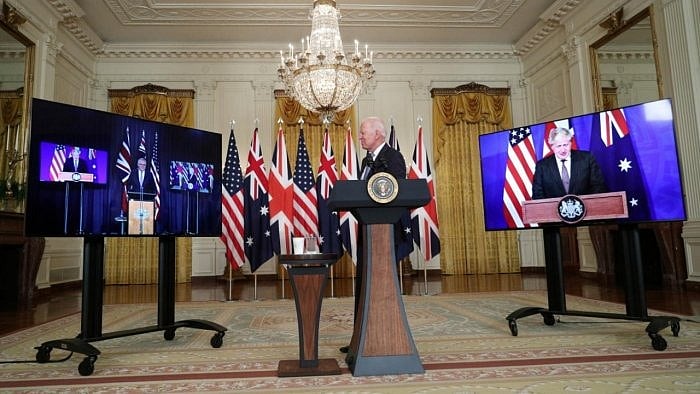 US President Joe Biden delivers remarks on a National Security Initiative virtually with Australian Prime Minister Scott Morrison and British Prime Minister Boris Johnson, inside the East Room at the White House in Washington, US. Credit: Reuters Photo
