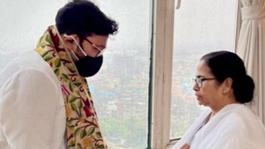 TMC leader Babul Supriyo with West Bengal CM Mamata Banerjee during a meeting in Kolkata. Credit: PTI Photo