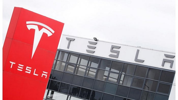 Musk has said a Tesla with eight cameras will be far safer than human drivers. Credit: Reuters File Photo