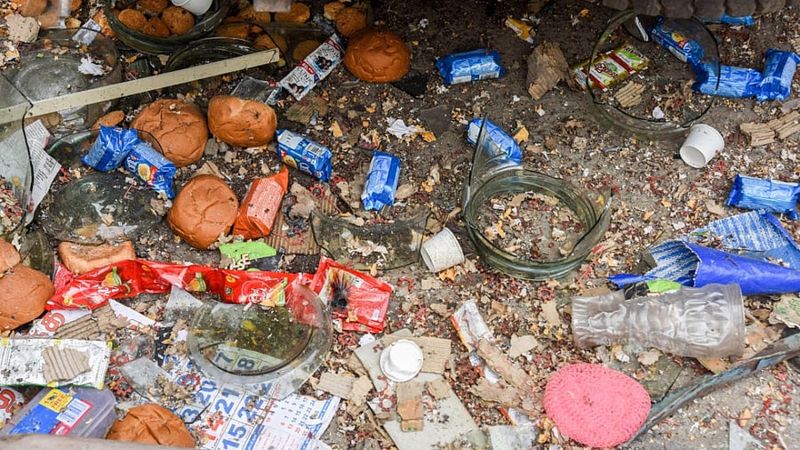 Things strewn all over the site of the blast in New Tharagupet, Bengaluru, on Thursday. Credit: DH Photo/M S Manjunath