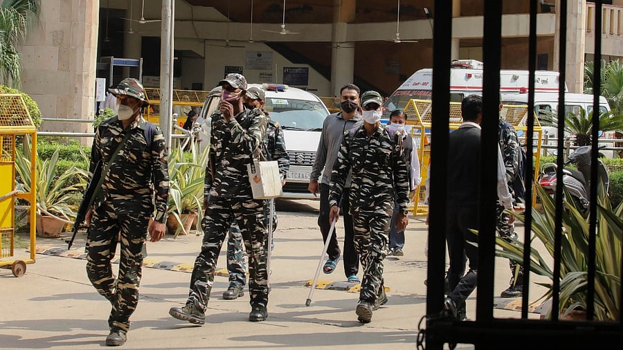 Police personnel at Rohini Court, where a shootout took place while gangster Jitender Gogi was being produced, in New Delhi. Credit: PTI Photo