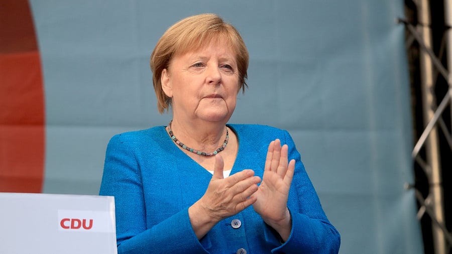 German Chancellor Merkel and CDU party leader and candidate for chancellor Laschet attend a rally, in Aachen. Credit: Reuters Photo