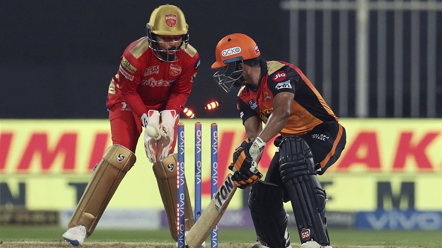 Kedar Jadhav of Sunrisers Hyderabad is bowled by Ravi Bishnoi of Punjab Kings during match 37 of the Indian Premier League between the Sunrisers Hyderabad and Punjab Kings, at the Sharjah Cricket Stadium, Sharjah in the United Arab Emirates. Credit: PTI Photo