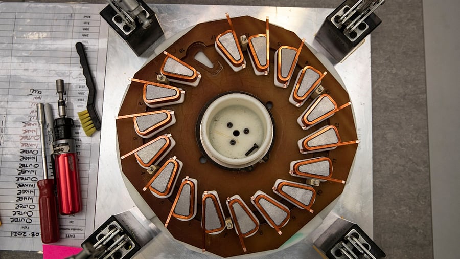 A view of the stator segments with concentrated coils during the production of YASA lightweight axial-flux electric motor. Credit: Reuters Photo
