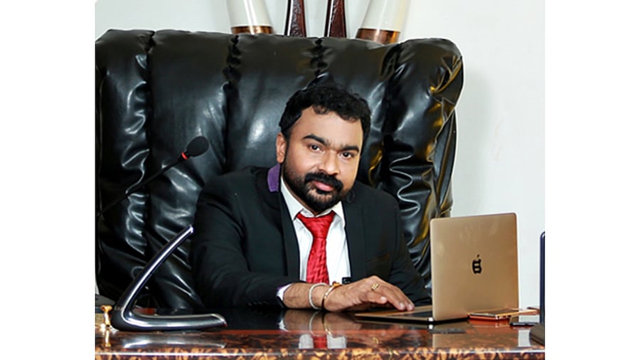 Monson Chacko alias Monson Mavungal, 52, was held by the Kerala Police's Crime Branch during the late hours of Saturday. Credit: Special Arrangement