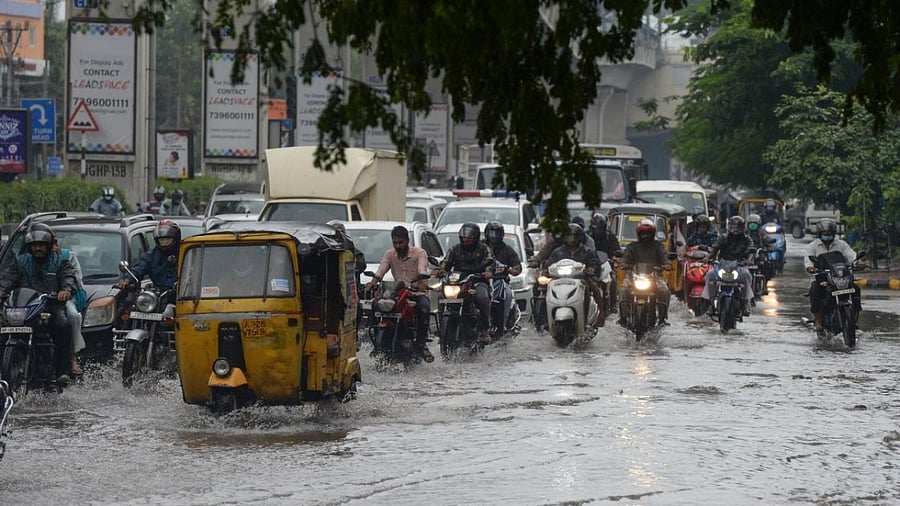 Motorists make their way through a water-logged street amid heavy rains in Hyderabad on September 27, 2021, the morning after cyclone Gulab made landfall between the coastal Indian states of Odisha and Andhra Pradesh. Credit: AFP Photo