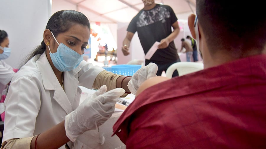 Karnataka inoculated more than 82 per cent of its adult population with the first dose (as on Sept 28). Credit: DH Photo/Pushkar V