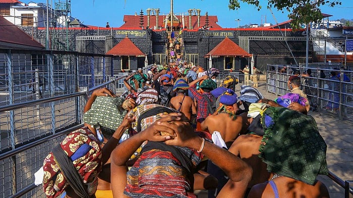 File photo of  devotees at Sabarimala Temple. Credit: PTI Photo