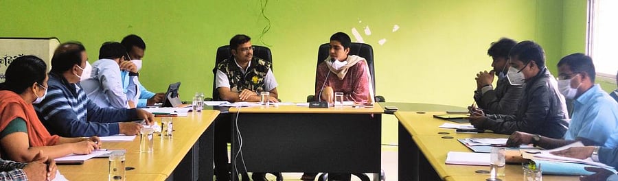 Deputy Commissioner Charulata Somal chairs the coordination committee meeting at Aranya Bhavan in Madikeri. Kodagu Circle CCF Takat Singh Ranaut looks on, among others. DH Photo