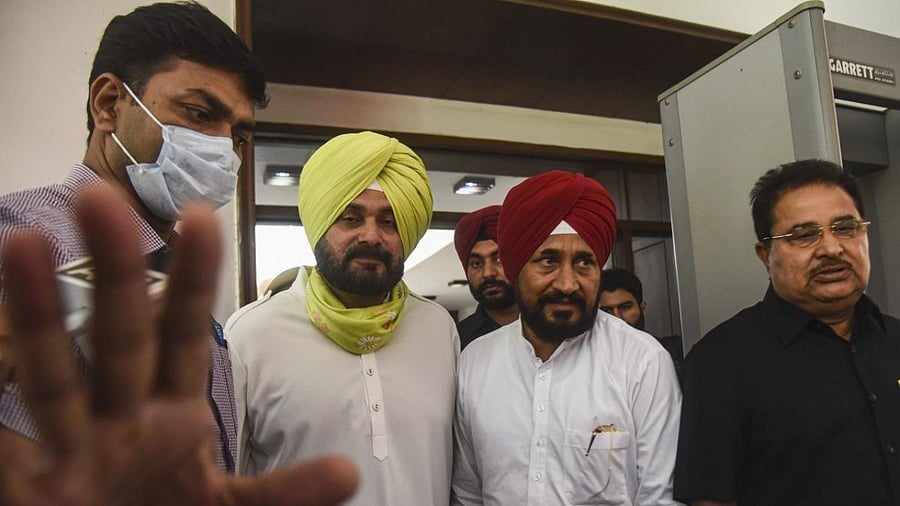 File Photo of Chief Minister of Punjab Charanjit Singh Channi with Navjot Singh Sidhu. Credit: PTI Photo