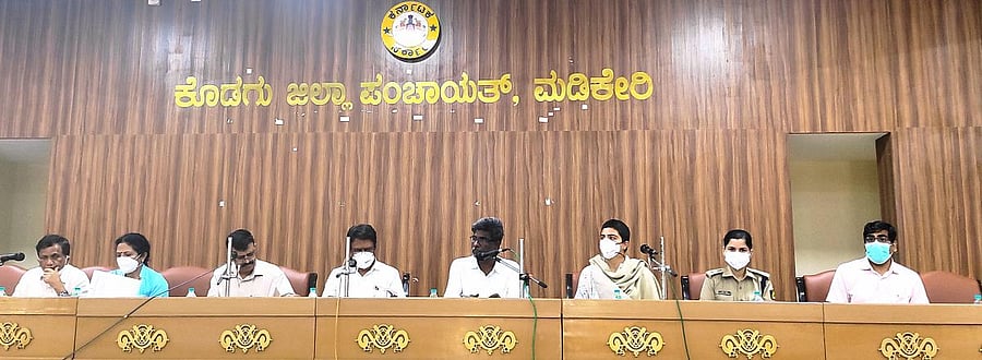 The minister for social welfare and backward classes speaks at a meeting in Madikeri.