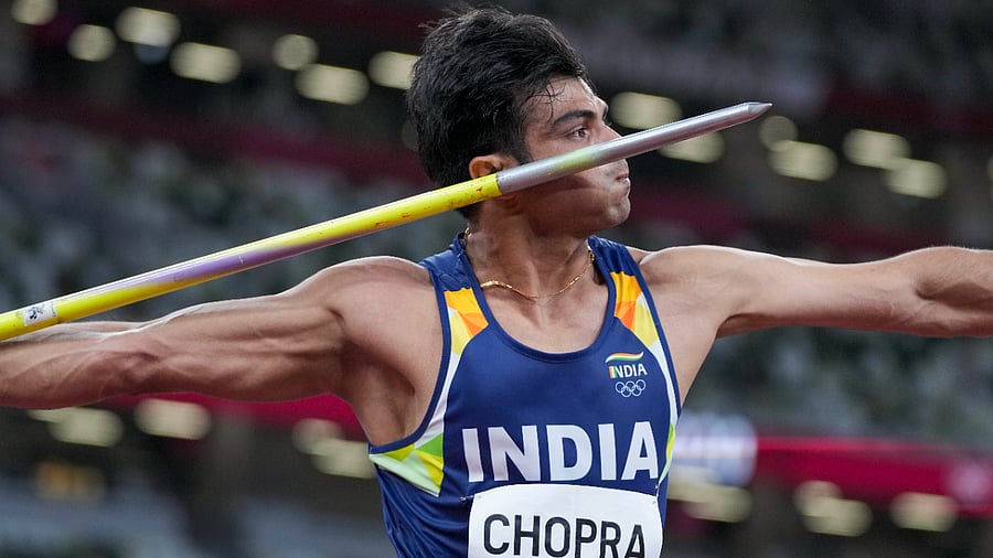 Neeraj Chopra with his javelin. Credit: AP Photo