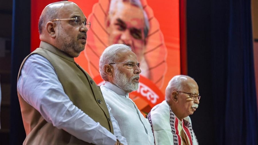 Amit Shah (L), PM Narendra Modi, and L K Advani (R). Credit: PTI File Photo