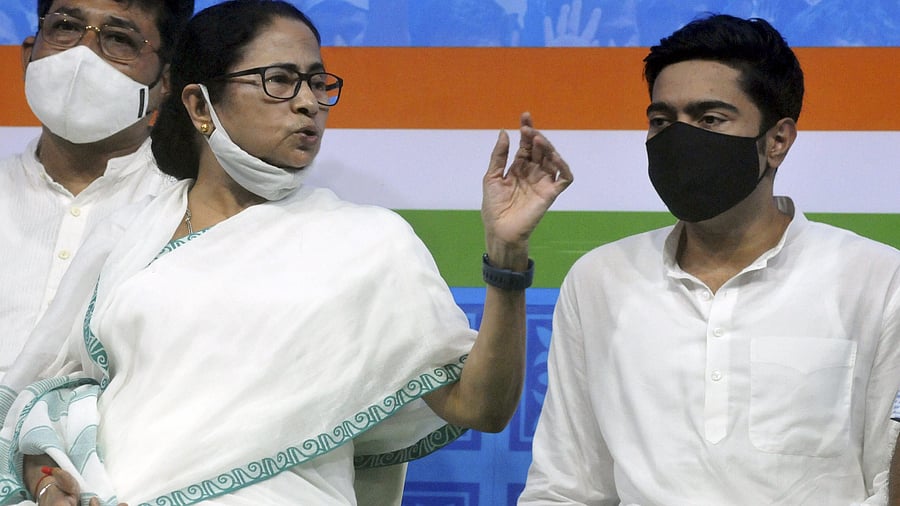 Mamata Banerjee (L) with Party General Secretary and MP Abhishek Banerjee (R). Credit: PTI Photo