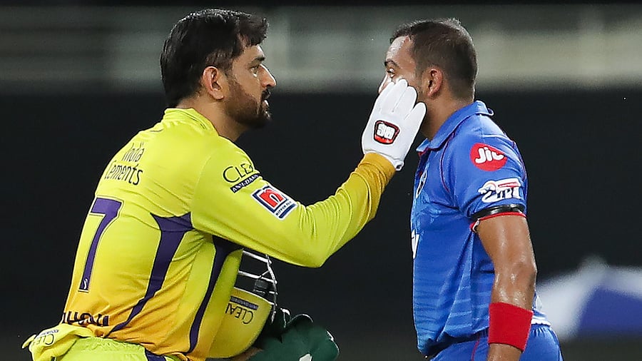 CSK skipper MS Dhoni assists Delhi Capitals (DC) batsman Prithvi Pankaj Shaw. Credit: PTI Photo