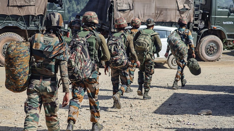  Security personnel at the encounter site near Dehra Ki Gali area in Poonch district. Credit: PTI Photo