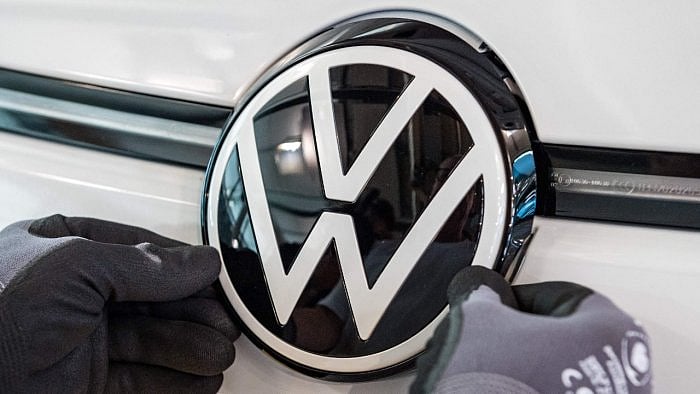 VW logo is seen at the assembly line for the Volkswagen ID 3 electric car. Credit: AFP File Photo