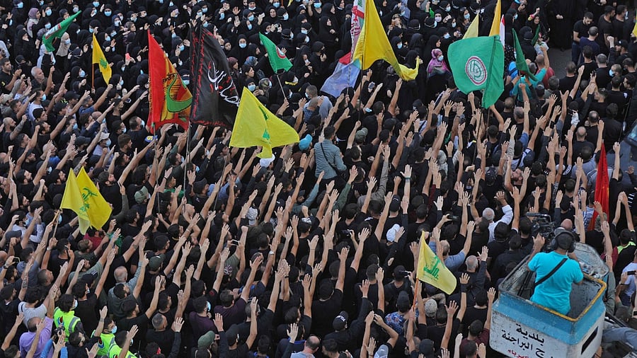 Seven people died and dozens were wounded as a result of violence that erupted Thursday following a rally by Shiite protesters demanding the dismissal of the judge investigating last year's devastating Beirut port blast. Credit: AFP Photo