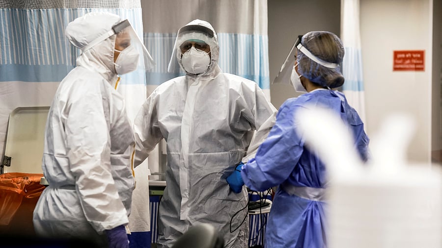 Medical staff chat inside the coronavirus disease (Covid-19) ward. Credit: Reuters Photo