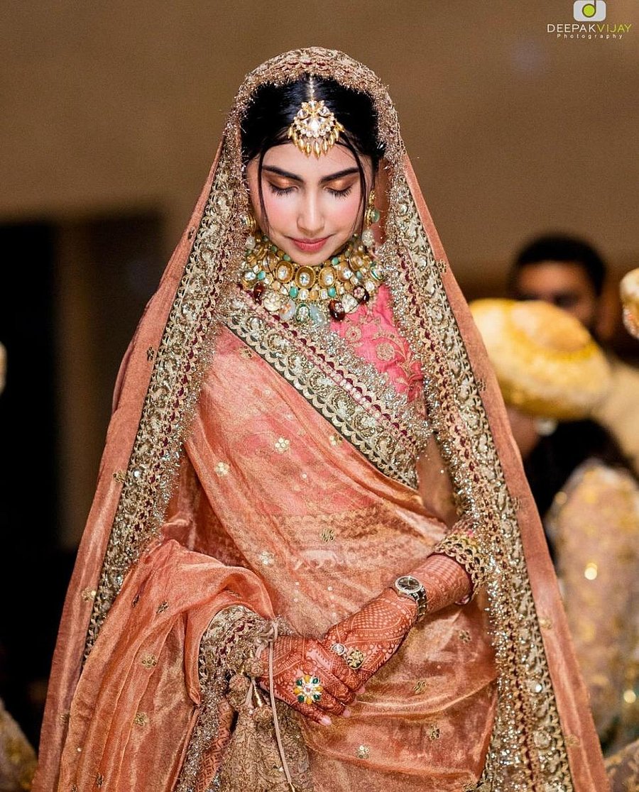 Moody tones of rust and mauve, embellished with heavy embroidery, are popular among brides this year. Makeup by Lubna Malik. Photo: Deepak Vijay Photography