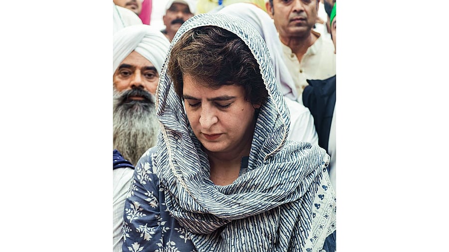 Congress leader Priyanka Gandhi Vadra with others attend the 'Antim Ardas' of farmers who killed in Lakhimpur Kheri incident, at Tikonia in Lakhimpur Kheri. Credit: PTI File Photo
