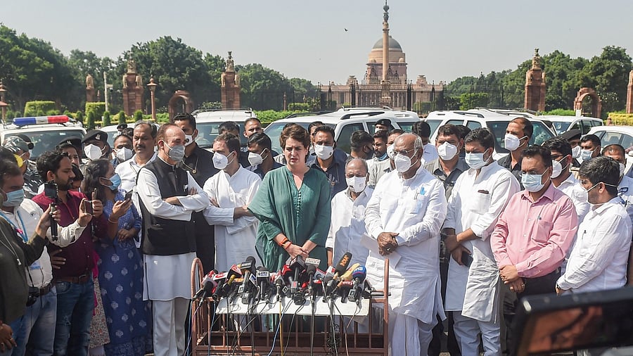 Congress delegation members MP Rahul Gandhi, Leader of Opposition in Rajya Sabha Mallikarjun Kharge, senior leader Ghulam Nabi Azad, MP A.K. Antony, and party General Secretary Priyanka Gandhi, address media after a meeting with President Ram Nath Kovind on the Lakhimpur Kheri incident. Credit: PTI Photo