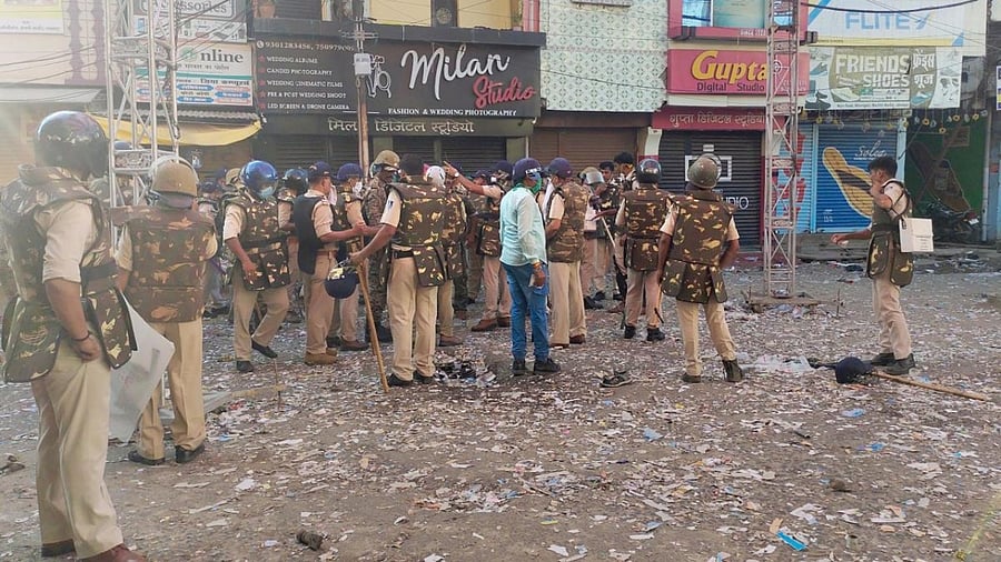 Police patrol in streets after a protest at Miloniganj in Jabalpur. Credit: PTI Photo