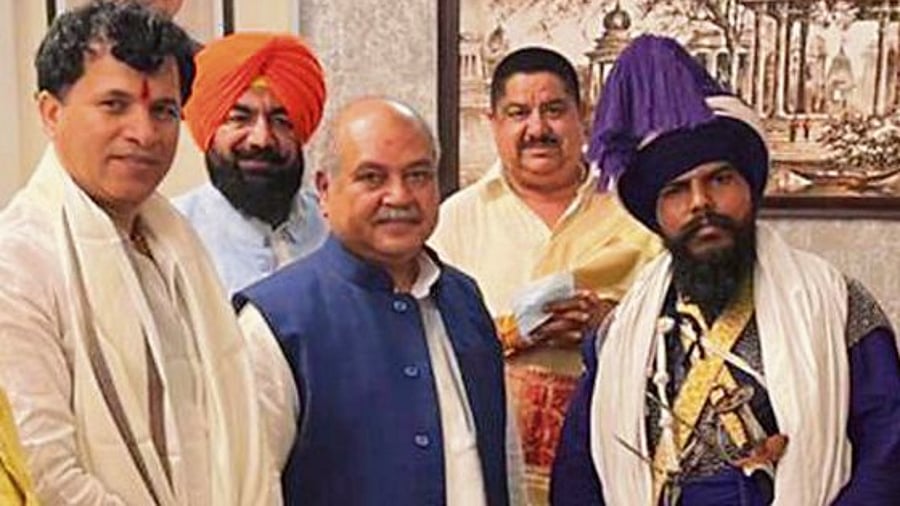 A new spin on the crime has been put by a media expose that the leader of the Nihang Sikh group responsible for mutilating and murdering a Dalit Sikh, Lakhbir Singh, ostensibly for disrespecting the Sikh holy book, was part of 'behind the scene efforts' by the Centre to end the farmers' agitation. Credit: Twitter/@Gurwind60490423