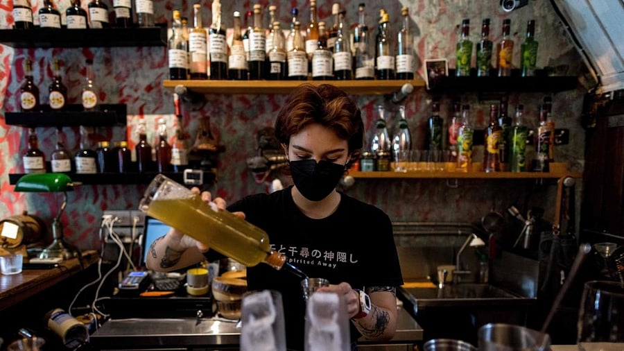 As gin bottles gather dust, a Bangkok bar owner is trying to keep his joint going through a Covid booze ban with fruity mocktails. Credit: AFP Photo