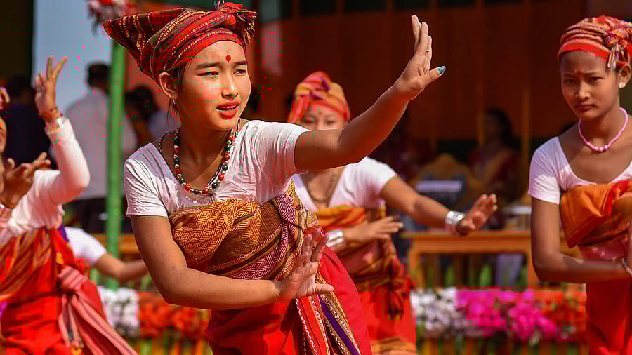 : Women belonging to a tribal community perform traditional dance during an event. Credit: PTI File Photo