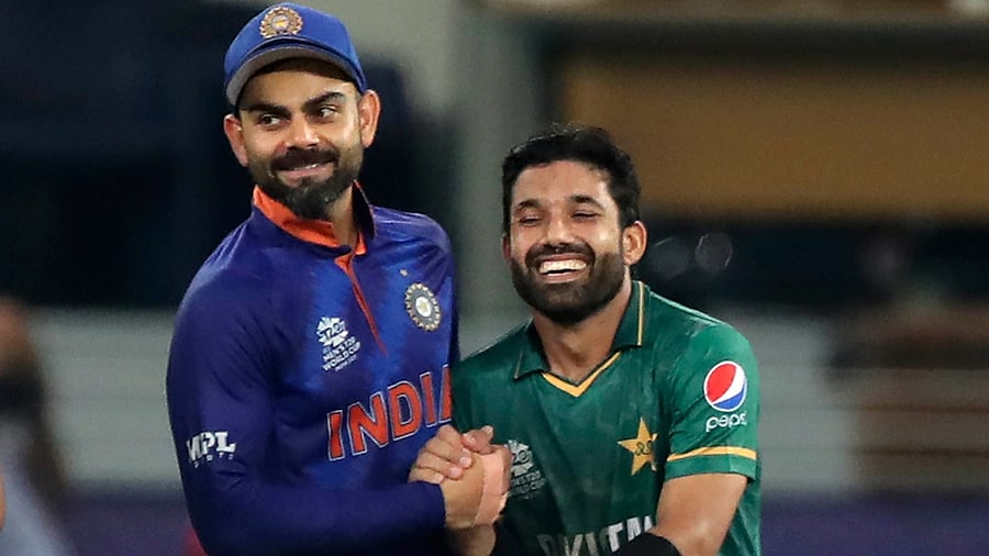 Indian cricket captain Virat Kohli, left, hugs Pakistan's Mohammad Rizwan after Pakistan won the the Cricket Twenty20 World Cup match between India and Pakistan in Dubai, UAE. Credit: AP/PTI Photo
