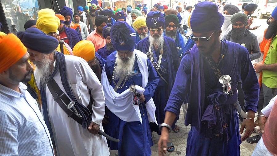 Nihang Sardars arrive for 'Kisan Mahapanchayat' at Singhu border. Credit: PTI Photo
