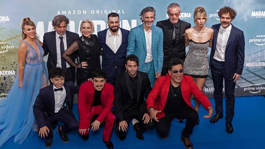 The cast of Amazon Prime´s series "Maradona, Sueno Bendito" (Maradona, Blessed Dream) poses during its presentation at the Diego Armando Maradona stadium in Buenos Aires. Credit: AFP Photo
