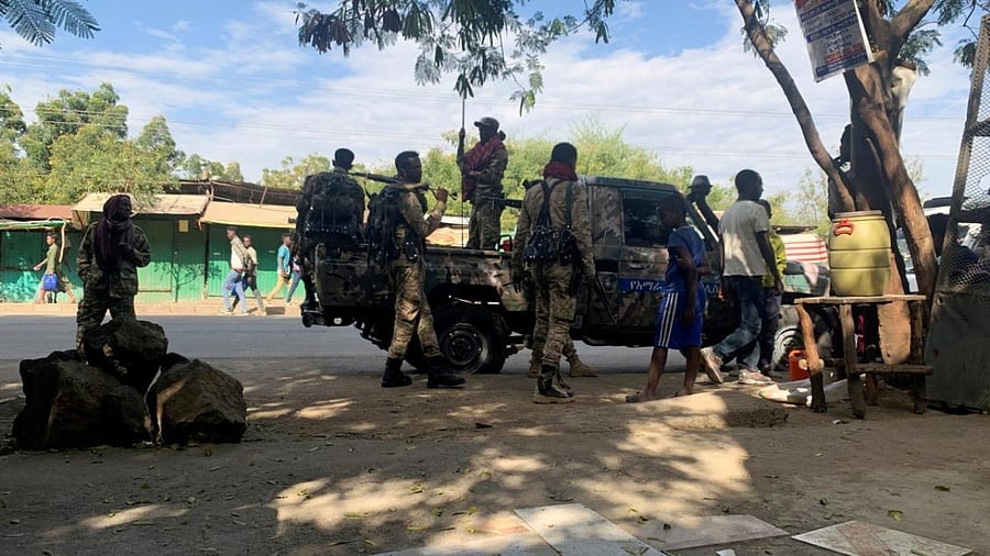 Members of the Ethiopian National Defense Force (ENDF) prepare to head to mission in Sanja, Amhara region, near a border with Tigray. Credit: Reuters photo