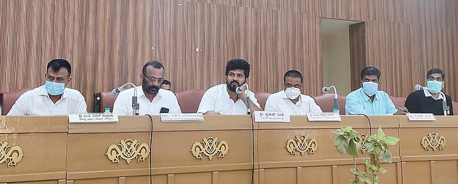 MP Pratap Simha chairs the District Development Coordination and Monitoring Committee (Disha) meeting at the Zilla Panchayat auditorium in Madikeri on Friday. DH Photo